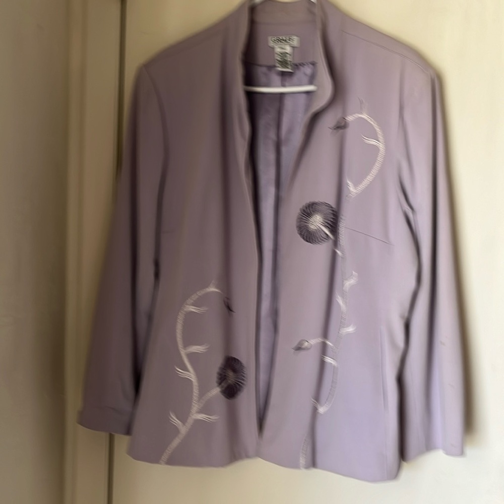 Jacket with embroidery on front. PXL. Lined